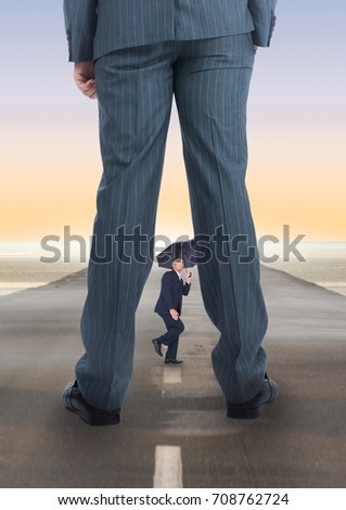 Digital composite of Scared small business man looking at a big business man