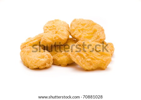 heap of chicken nuggets isolated on white background Royalty-Free Stock Photo #70881028