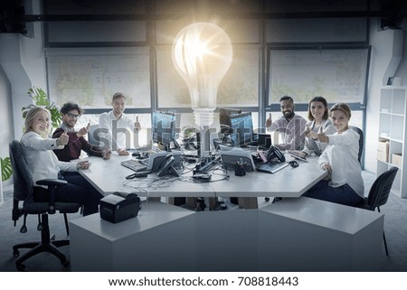 startup, technology and people concept - business team with tablet pc and computers showing thumbs up at office