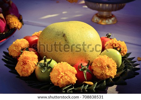 Fruit , vegetable and flower on banana leaf dish  to warship holy thing.
