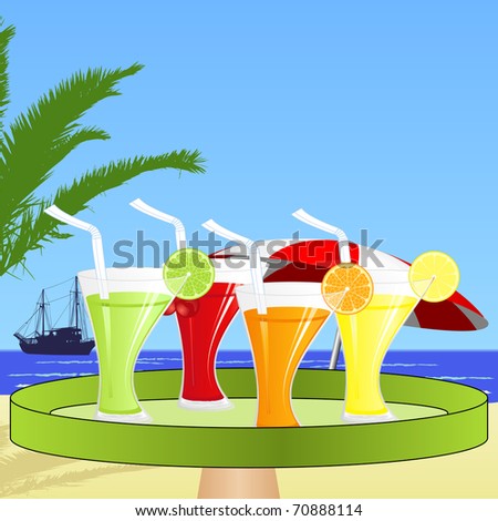 A waiter brings fruit juices on the beach
