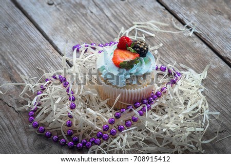 Bun with raspberry and pineapple isolated on a white background