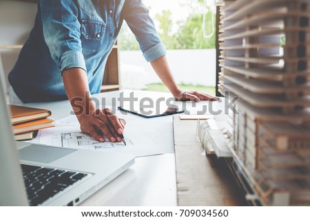  Architect Engineer Design Working on Blueprint Planning Concept. Construction Concept Royalty-Free Stock Photo #709034560