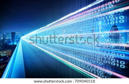 Highway flyover with binary code numbers on motion blurred asphalt  road , speed and faster digital matrix technology information concept . Royalty-Free Stock Photo #709040518