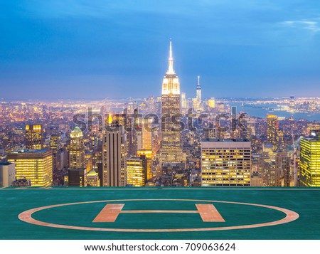 New York City skyline with urban skyscrapers at dusk with Hilipad , USA.