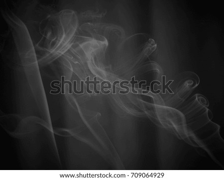 A monochromatic smoke texture with a dark vignette border. 