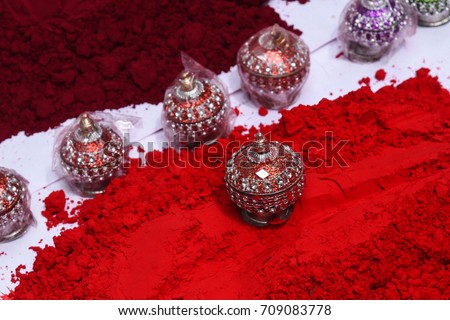 Colourful Indian Lac / Traditional Rajasthani small Sindhoor Boxes decorated with mirror, beads displayed in street shop Udaipur, Rajasthan India. married Indian Hindu women wear vermilion red powder 
