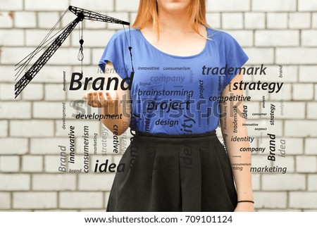 brand concept.photo for your design. girl in blue near a white brick wall