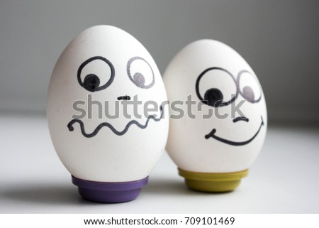 funny funny eggs. two eggs on a diet. photo for your design