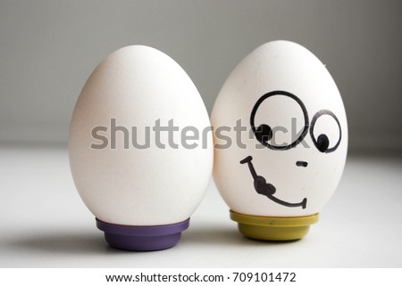 funny funny eggs. two eggs balanced nutrition. photo for your design
