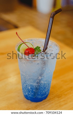 Blue Cocktail Drink with cherries and lemon