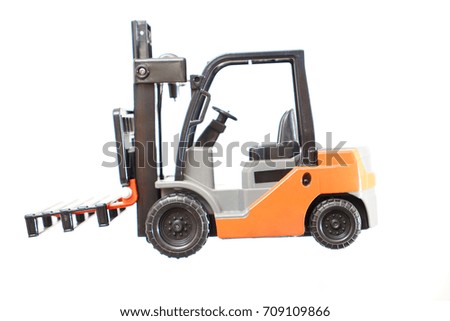Construction Equipment Toys isolated on white background. Forklift toy.  empty palette               