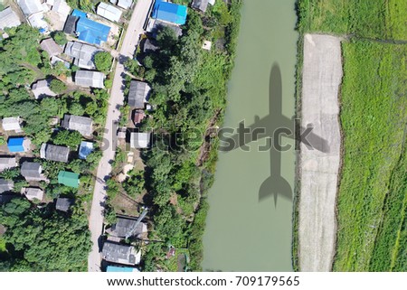Top view or Aerial view of landscape village countryside and green field, Thailand on green trees nature and mountain background - Take a photo by drone camera