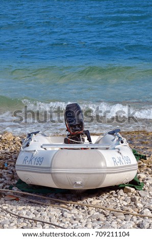 Motor boat on the beach close up photo