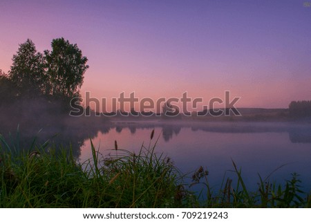 Foggy sunrise in the forest river