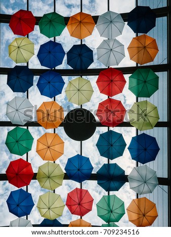 Colorful Umbrellas Hanging In Sky