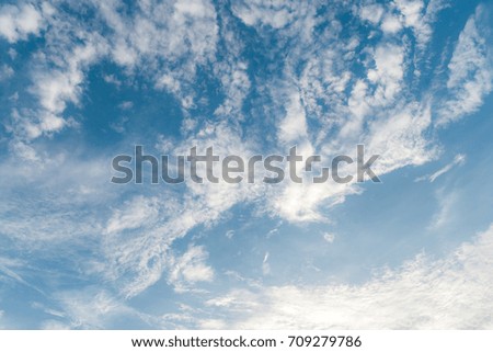 Summer sky and beautiful sun in the blue sky with clouds.
