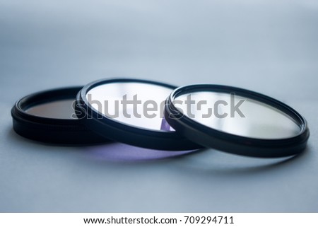 Set of camera lens filters -  Ultra-Violet Filter (UV), Circular Polarizer Filter (CP), Neutral Density Filter (ND) - selective focus