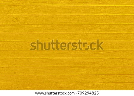 Gold yellow color texture pattern abstract background can be use as wall paper screen saver brochure cover page or for presentations background or articles background also have copy space for text.