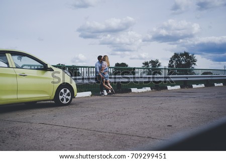 Couple in love traveling by car.