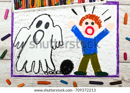 Photo of colorful drawing: Scary ghost with chains and scared little boy