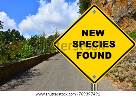New species found scientific discovery road sign