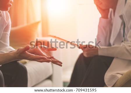 Healthcare concept of professional psychologist doctor consult in psychotherapy session or counsel diagnosis health. Women's Health concept. Royalty-Free Stock Photo #709431595
