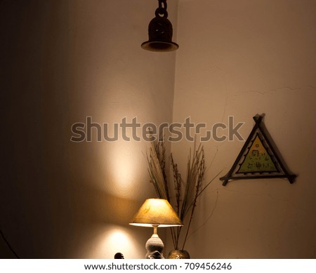Lamp shade with decorative items for home Royalty-Free Stock Photo #709456246
