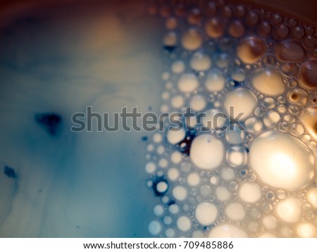 Bubbles, Watercolor paint dissolves in water, backlighting from different directions, large magnification, bokeh, Colored abstractions