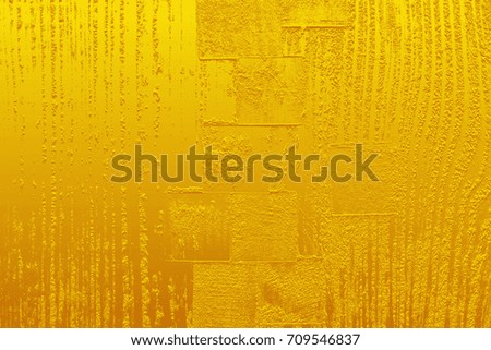 Gold yellow color texture pattern abstract background can be use as wall paper screen saver brochure cover page or for presentations background or articles background also have copy space for text.
