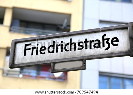 Indication of the street in the center of the city called Friedrich Strasse in Berlin