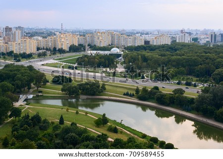 High view of Minsk cityscape, trees and buildings.  Royalty-Free Stock Photo #709589455