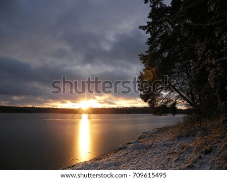 Sunset at winter lake