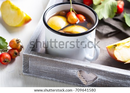 Fruit compote berries vitamins drink wooden background