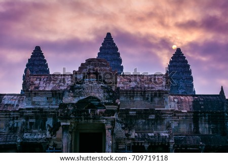 Amazing view of Angkor Wat temple at sunrise. The temple complex Angkor Wat in Cambodia is the largest religious monument in the world. Location: Siem Reap, Cambodia. Artistic picture. Beauty world