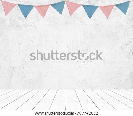 Colorful bunting party flags hanging on empty white wall and perspective wood background, decorate items for festival, celebrate event background, holiday greeting card