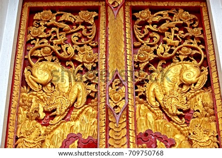 Traditional Thai style Naga stucco in temple