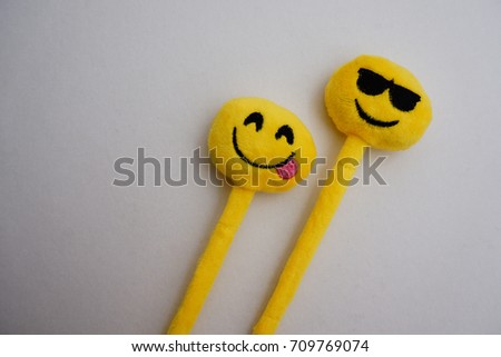 Cool emoji with glasses and tongue jelly on isolated white background.