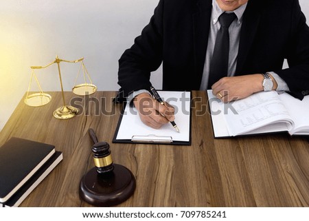 lawyer or  judge work in the office with gavel and balance