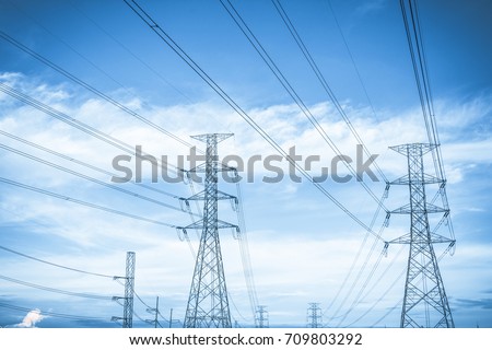 Green energy concept, Electricity station, Close up high voltage power lines at sunset. electricity distribution station. high voltage electric transmission pylon silhouetted  tower.