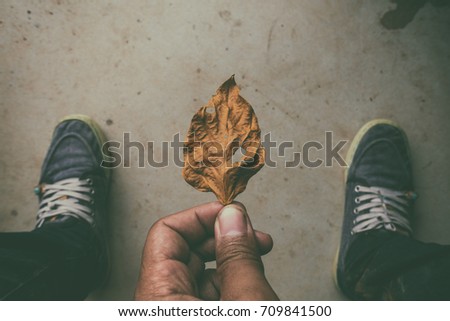 a man Looking down on feet, selective focus
