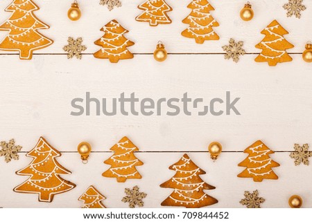 christmas homemade gingerbread cookies on wooden table, top view, copy space, frame
