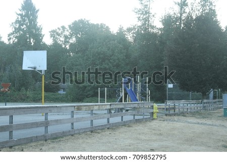 A playground in a school yard waiting for the first day of school.