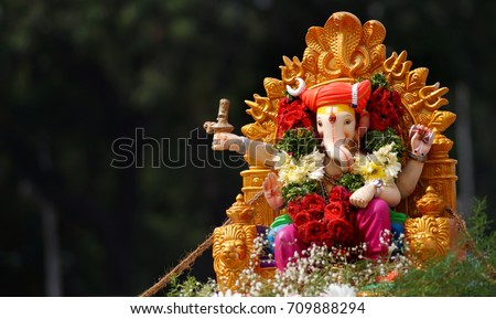 Hindu devotees bring Ganesha Idol for immersion in water body on 11th day of Ganesha Chathurthi festival celebration,annual ritual                             