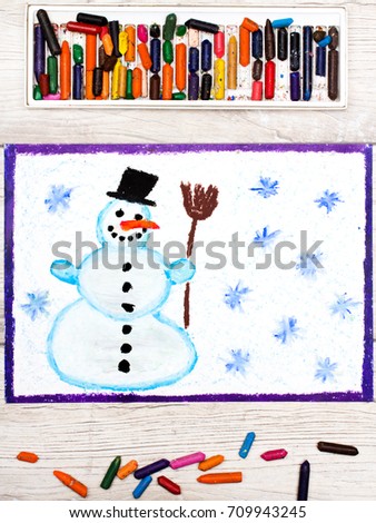 Photo of colorful drawing: Happy snowman with broom. 