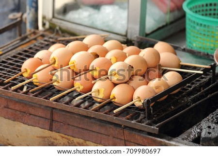 grilled eggs as a snack at one of Thailand's popular.