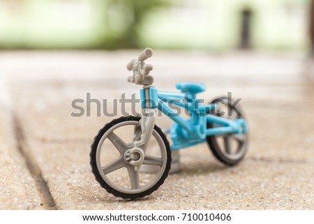 Miniature toy bicycle. Bike sport concept.