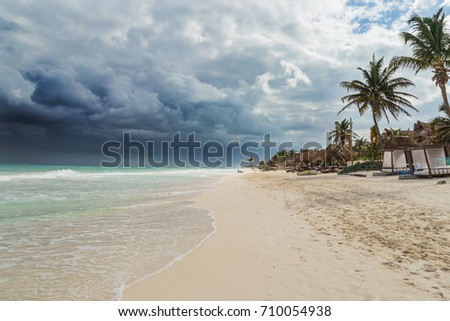 A tropical storm in the Atlantic Ocean. A hurricane into the Caribbean Sea, the Mexican Gulf