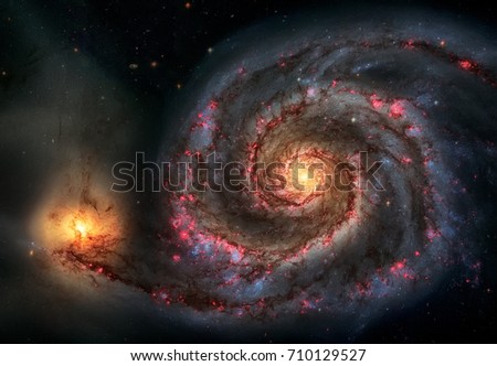 Whirlpool Galaxy and Companion. Winding arms of the spiral galaxy M51 or NGC 5194 appear like a grand spiral staircase sweeping through space. Elements of this image furnished by NASA.