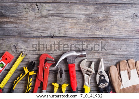 Set of tools on wooden background . Top view with space for text Royalty-Free Stock Photo #710141932